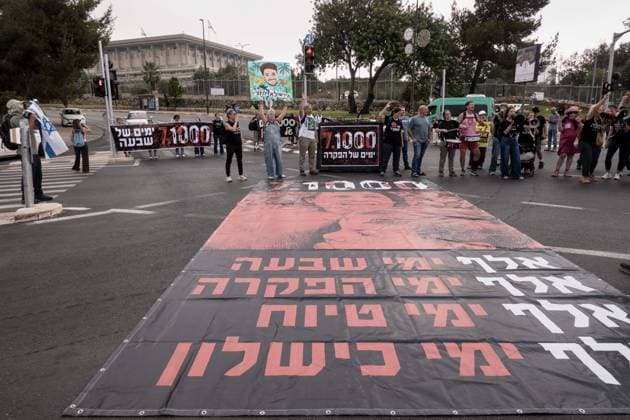 July 2, 2026, Jerusalem, Israel: Anti government protesters deploy a massive crate to block the main intersection outside the Knesset during a nationwide Day of Rage. Activists gathered at exactly 6:29 a.m. to mark the 1,000th day since the October 7, 2023 attacks, which they have dubbed the Netanyahu Massacre, demanding accountability for the government s failure to prevent the initial attacks, secure the release of all hostages alive, the ongoing 3 year war and for establishing a state commission of inquiry. Jerusalem Israel - ZUMAa126 20260702_zap_a126_001 Copyright: xNirxAlonx
