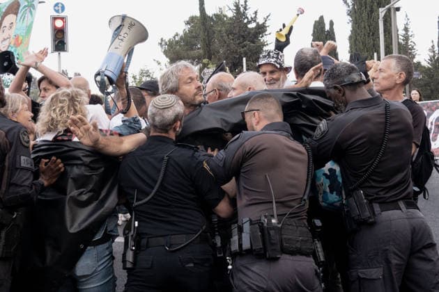 July 2, 2026, Jerusalem, Israel: Anti government protesters deploy a massive crate to block the main intersection outside the Knesset during a nationwide Day of Rage. Activists gathered at exactly 6:29 a.m. to mark the 1,000th day since the October 7, 2023 attacks, which they have dubbed the Netanyahu Massacre, demanding accountability for the government s failure to prevent the initial attacks, secure the release of all hostages alive, the ongoing 3 year war and for establishing a state commission of inquiry. Jerusalem Israel - ZUMAa126 20260702_zap_a126_005 Copyright: xNirxAlonx