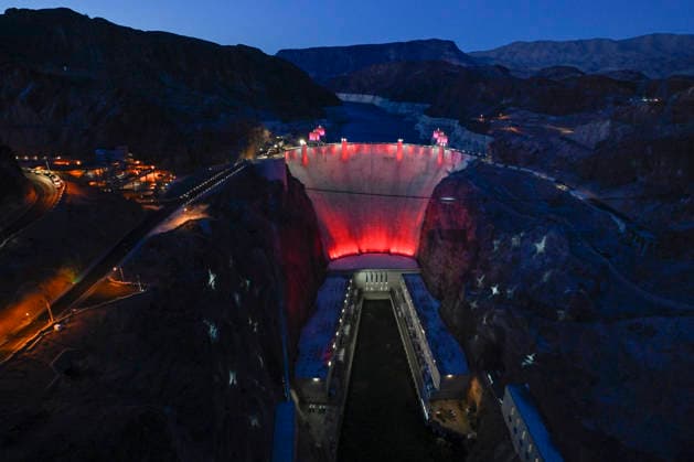 July 1, 2026 - Boulder City, Nevada, U.S. - Patriotic lighting illuminates the Hoover Dam on July 1, 2026 in the Lake Mead National Recreation Area, near Boulder City, Nevada. The dam will be lit through July 4, 2026 to mark the 250th anniversary of the United States Declaration of Independence. Boulder City USA - ZUMAbk3_ 20260701_zaf_bk3_002 Copyright: xDavidxBeckerx