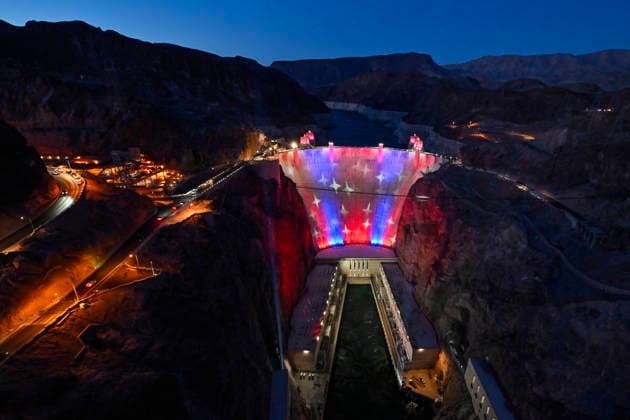 July 1, 2026 - Boulder City, Nevada, U.S. - Patriotic lighting illuminates the Hoover Dam on July 1, 2026 in the Lake Mead National Recreation Area, near Boulder City, Nevada. The dam will be lit through July 4, 2026 to mark the 250th anniversary of the United States Declaration of Independence. Boulder City USA - ZUMAbk3_ 20260701_zaf_bk3_003 Copyright: xDavidxBeckerx