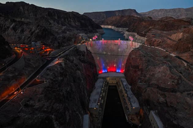 July 1, 2026 - Boulder City, Nevada, U.S. - Patriotic lighting illuminates the Hoover Dam on July 1, 2026 in the Lake Mead National Recreation Area, near Boulder City, Nevada. The dam will be lit through July 4, 2026 to mark the 250th anniversary of the United States Declaration of Independence. Boulder City USA - ZUMAbk3_ 20260701_zaf_bk3_010 Copyright: xDavidxBeckerx