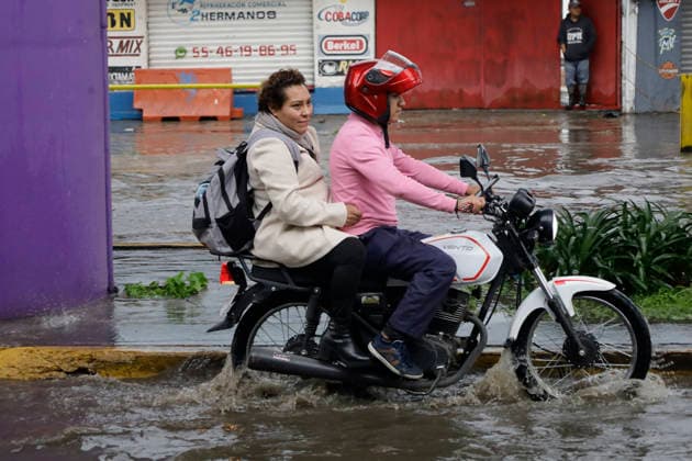 Flooding Reported In Mexico City Motorcyclists ride along Avenida Tlahuac in Mexico City, Mexico, on July 1, 2026, while flooding is reported in the streets of Santiago Zapotitlan. The Mexico City Water Management Secretariat activates a yellow alert for rain and flooding in several areas of the capital. Mexico City Mexico City Mexico  Copyright: xGerardoxVieyrax originalFilename: vieyra-notitle260701_nppUs.jpg