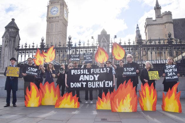July 2, 2026, London, England, United Kingdom: Activists from Fossil Free London stage a protest outside the parliament calling on Andy Burnham, who is expected to become the next UK Prime Minister, not to open the North Sea to oil and gas projects like Jackdaw and Rosebank. London United Kingdom - ZUMAv130 20260702_zip_v130_011 Copyright: xVukxValcicx