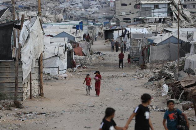 Displaced Palestinians Shelter Near Destroyed Homes as War Reaches 1,000 Days Displaced Palestinians go about their daily lives in worn-out tents erected near their destroyed homes east of Gaza City on July 2, 2026, as the war enters its 1,000th day. Hundreds of thousands of Palestinians continue to live in shelters and temporary camps following repeated displacement, while facing shortages of water, food and essential services, according to the United Nations and humanitarian organizations. Photo by Bilal Osama apaimages Gaza city Gaza Strip Palestinian Territory 020726_Gaza_BO_01(15) Copyright: xapaimagesxBilalxOsamax xapaimagesx