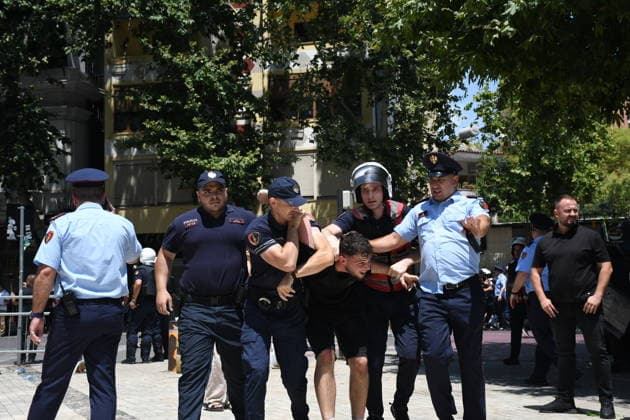 Protest over Zvernec Tourism Project held outside Albanian Parliament TIRANA, ALBANIA - JULY 2: Demonstrators protesting a planned tourism development project in the Zvernec area of Vlora gather outside the Albanian Parliament in Tirana on July 2, 2026, as protests that have continued for more than a month entered a new phase. Scuffles broke out between police and protesters during the demonstration. Protesters threw eggs and flour at police officers, members of parliament and parliamentary vehicles. Olsi Shehu Anadolu Tirana Albania. Editorial use only. Please get in touch for any other usage.  Copyright: x2026xAnadoluxOlsixShehux