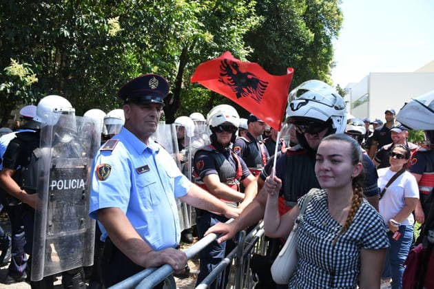 Protest over Zvernec Tourism Project held outside Albanian Parliament TIRANA, ALBANIA - JULY 2: Demonstrators protesting a planned tourism development project in the Zvernec area of Vlora gather outside the Albanian Parliament in Tirana on July 2, 2026, as protests that have continued for more than a month entered a new phase. Scuffles broke out between police and protesters during the demonstration. Protesters threw eggs and flour at police officers, members of parliament and parliamentary vehicles. Olsi Shehu Anadolu Tirana Albania. Editorial use only. Please get in touch for any other usage.  Copyright: x2026xAnadoluxOlsixShehux