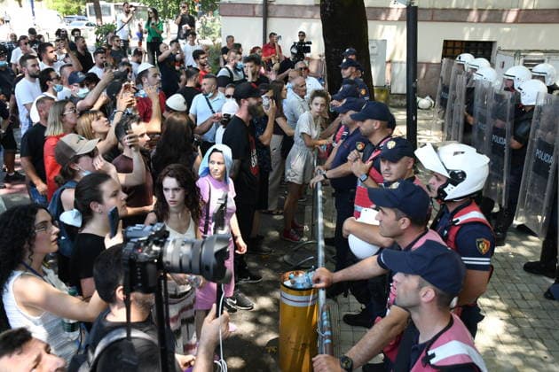 Protest over Zvernec Tourism Project held outside Albanian Parliament TIRANA, ALBANIA - JULY 2: Demonstrators protesting a planned tourism development project in the Zvernec area of Vlora gather outside the Albanian Parliament in Tirana on July 2, 2026, as protests that have continued for more than a month entered a new phase. Scuffles broke out between police and protesters during the demonstration. Protesters threw eggs and flour at police officers, members of parliament and parliamentary vehicles. Olsi Shehu Anadolu Tirana Albania. Editorial use only. Please get in touch for any other usage.  Copyright: x2026xAnadoluxOlsixShehux