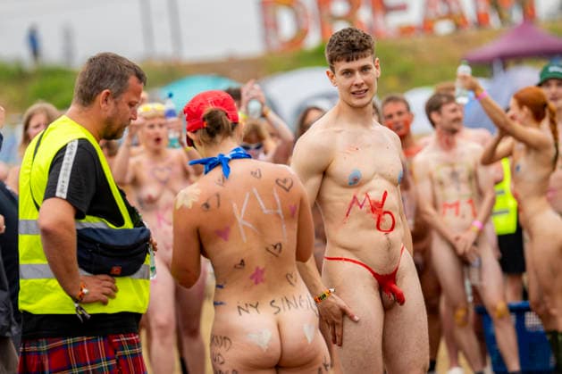 Roskilde Festival 2026: The Annual Naked Run The male winner of the annual naked run in Dream City, Aslak, at Roskilde Festival, Thursday, July 2, 2026. (Photo: Ida Marie Odgaard Ritzau Scanpix) , Roskilde Denmark *** Roskilde Festival 2026 The Annual Naked Run Aslak, the male winner of the annual naked run in Dream City, at Roskilde Festival, Thursday, July 2, 2026. Photo by Ida Marie Odgaard, Ritzau Scanpix, Roskilde, Denmark  Copyright: RitzauxScanpix IdaxMariexOdgaardx spdk20260702-152351-L