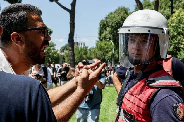 Day 33 Protest Turns Violent in Tirana TIRANA, ALBANIA JULY 2, 2026: Demonstrators gathered outside the Albanian Parliament during the thirty-third consecutive day of protests against a proposed luxury tourism development project linked to Jared Kushner and other international investors. Protesters threw eggs toward lawmakers and official vehicles as members of parliament arrived for the parliamentary session. Clashes erupted after police intervened, using tear gas, pepper spray and water cannons to disperse demonstrators, while protesters responded by throwing stones and damaging a police vehicle. Around 20 protesters were detained, according to protest organizers, before the movement continued with its scheduled evening demonstration Copyright: x xVlasovxSulajx xJNAxPressx