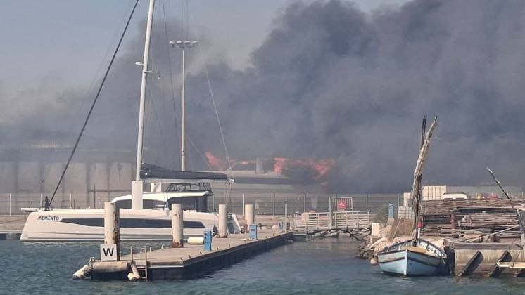 Huge Wildfire hits Canet en Roussillon - South of France Smoke is seen over Canet en Roussillon , south of France as huge fire and flames engulfed yachts and campsites, with campers evacuated from the seaside resort of Canet-en-Roussillon. The wildfires tore across southern France after the country baked under weeks of hot weather, hitting record temperatures. Photo by CLPRESS ABACAPRESS.COM Canet en Roussillon France  Copyright: xABACAx