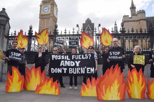 July 2, 2026, London, England, United Kingdom: Activists from Fossil Free London stage a protest outside the parliament calling on Andy Burnham, who is expected to become the next UK Prime Minister, not to open the North Sea to oil and gas projects like Jackdaw and Rosebank. London United Kingdom  - ZUMAv130 20260702_zip_v130_042 Copyright: xVukxValcicx