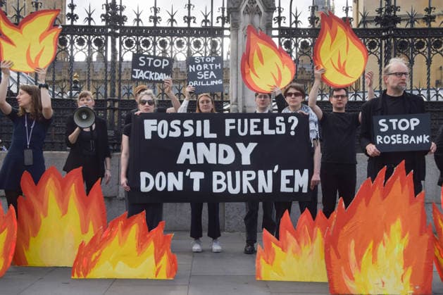 July 2, 2026, London, England, United Kingdom: Activists from Fossil Free London stage a protest outside the parliament calling on Andy Burnham, who is expected to become the next UK Prime Minister, not to open the North Sea to oil and gas projects like Jackdaw and Rosebank. London United Kingdom - ZUMAv130 20260702_zip_v130_044 Copyright: xVukxValcicx
