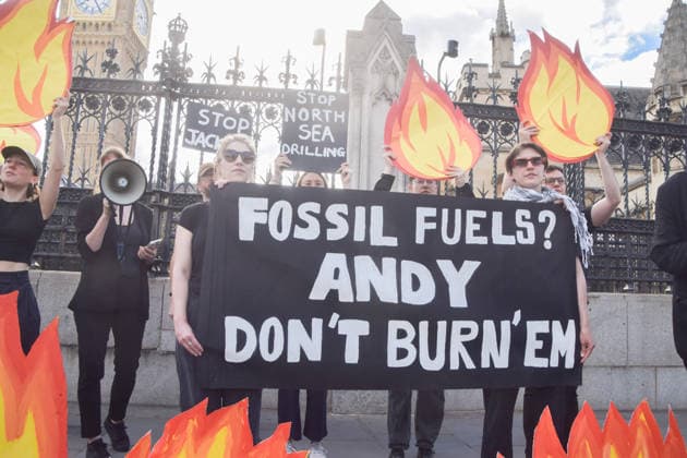 July 2, 2026, London, England, United Kingdom: Activists from Fossil Free London stage a protest outside the parliament calling on Andy Burnham, who is expected to become the next UK Prime Minister, not to open the North Sea to oil and gas projects like Jackdaw and Rosebank. London United Kingdom  - ZUMAv130 20260702_zip_v130_046 Copyright: xVukxValcicx