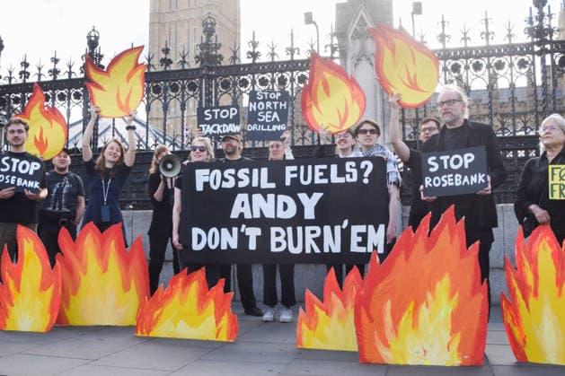 July 2, 2026, London, England, United Kingdom: Activists from Fossil Free London stage a protest outside the parliament calling on Andy Burnham, who is expected to become the next UK Prime Minister, not to open the North Sea to oil and gas projects like Jackdaw and Rosebank. London United Kingdom  - ZUMAv130 20260702_zip_v130_048 Copyright: xVukxValcicx