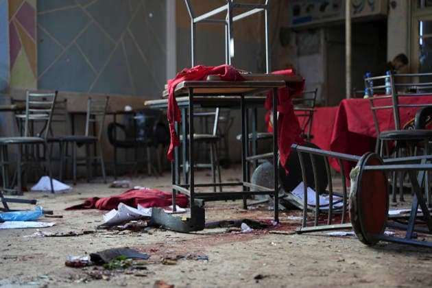Damascus Cafe Blast Aftermath Investigated Damaged furniture, debris and blood stains are seen behind police tape inside a cafe in central Damascus, Syria, on July 2, 2026. An explosive device detonated inside the cafe near the Palace of Justice in the al-Hijaz area, killing people and injuring others, Syrian authorities said. Damascus Damascus Syria Copyright: xOmarxAlbamx