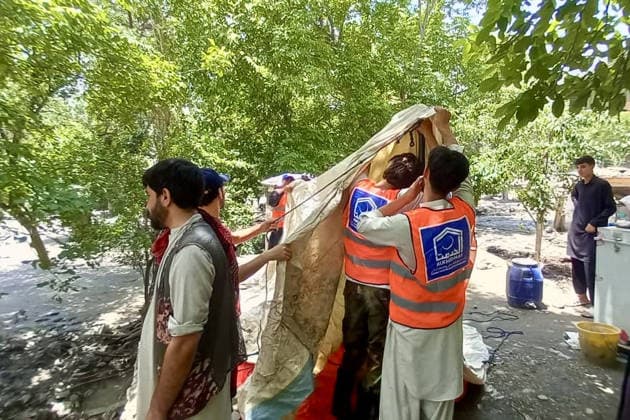July 2, 2026, Peshawar, Peshawar, Pakistan: Chitral Flood: Al-Khidmat Foundation Reaches Affected Families with Emergency Relief..CHITRAL, Pakistan July 1, 2026: Volunteers from Al-Khidmat Foundation distribute tents, tarpaulins, food packages and other essential relief items to families affected by flash floods in the Brozi and Ayoon areas of Lower Chitral. Torrential monsoon rains triggered flash flooding that damaged homes and infrastructure, prompting emergency humanitarian assistance for displaced residents as relief operations continue. Peshawar Pakistan  - ZUMAa217 20260702_znp_a217_008 Copyright: xHussainxAlix
