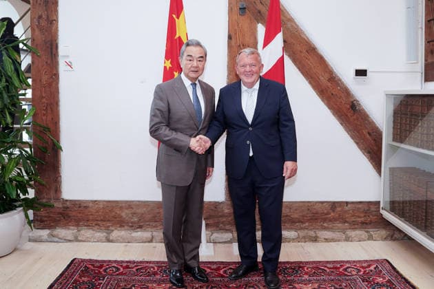 (260702) -- COPENHAGEN, July 2, 2026 -- Chinese Foreign Minister Wang Yi, also a member of the Political Bureau of the Communist Party of China Central Committee, holds talks with Danish Foreign Minister Lars Lokke Rasmussen in Copenhagen, Denmark, on July 2, 2026. ) DENMARK-COPENHAGEN-CHINESE FM-TALKS PengxZiyang 