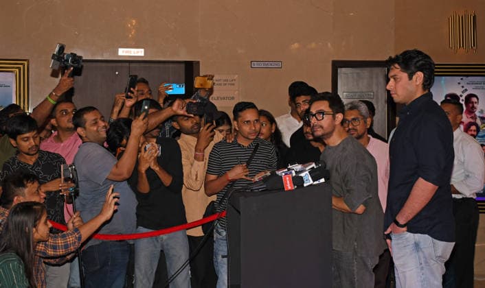 Celebrities attend screening of web series Pritam & Pedro in Mumbai - 02 Jul 2026 Bollywood actor Aamir Khan (R) interacts with the media as actor Junaid Khan (extreme right) looks on at the screening of web series Pritam & Pedro in Mumbai. Mumbai India Copyright: xAshishxVaishnavx xSOPAxImagesx AVaishnav_Celebrities attend screening of web series _Pritam _ Pedro_ in Mumbai (11)