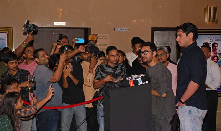 July 2, 2026, Mumbai, Maharashtra, India: Bollywood actor Aamir Khan (R) interacts with the media as actor Junaid Khan (extreme right) looks on at the screening of web series Pritam & Pedro in Mumbai. Mumbai India  - ZUMAs197 20260702_aaa_s197_212 Copyright: xAshishxVaishnavx