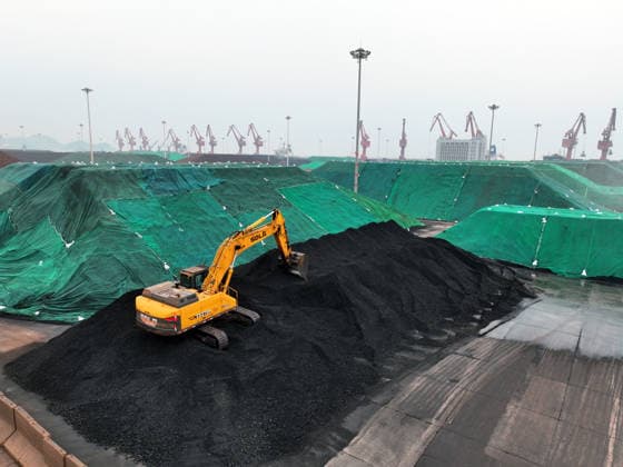 Lianyungang Port Coal Terminal LIANYUNGANG, CHINA - JULY 3, 2026 - Large machinery is stacking and storing imported coal at the coal terminal yard of Lianyungang Port in Jiangsu Province, China on July 3, 2026. Lianyungang Jiangsu China  Copyright: xCFOTOx i1783069302966