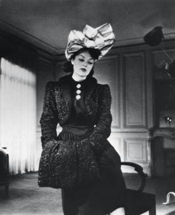 RECORD DATE NOT STATED Nina Ricci outfit worn by the fashion model Gabrielle, France, January 1943 Nina Ricci outfit worn by the fashion model Gabrielle, France, January 1943. The photographer is unknown. Editorial use only. All other uses to be cleared with the copyright owner (World History Archive), in advance., WHA_162_0510005140.jpg, Nina Ricci; outfit; fashion model; Gabrielle; France; 1943; vintage fashion; retro style; 1940s fashion; French fashion; historical clothing; black and white; elegant; chic; classic; stylish; designer; high fashion; runway; Parisian; glamorous; model posing; fashion photography; editorial; fashion history; iconic; sophisticated; luxury; couture; fashion industry. Copyright: xWorldxHistoryxArchivex