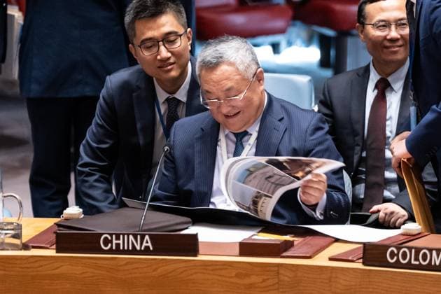 July 2, 2026, New York, New York, USA: Ambassador Fu Cong of China examines photographs of civilian targets hit by Iranian drones and missiles on the ground of Kingdom of Bahrain before the start of Security Council meeting on The situation in the Middle East requested by Kingdom of Bahrain at UN Headquarters in New York, NY on July 2, 2026. New York USA  - ZUMAr339 20260702_znp_r339_002 Copyright: xLevxRadinx