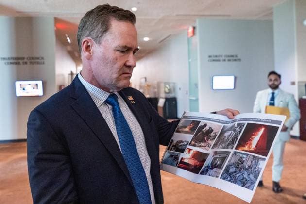 July 2, 2026, New York, New York, USA: Ambassador Mike Waltz of the United States holds photographs of civilian targets hit by Iranian drones and missiles while speaking to the press after Security Council meeting on The situation in the Middle East requested by Kingdom of Bahrain at UN Headquarters in New York, NY on July 2, 2026. New York USA - ZUMAr339 20260702_znp_r339_020 Copyright: xLevxRadinx