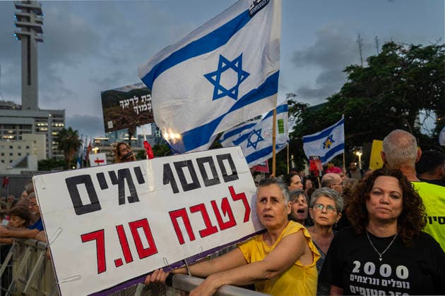 July 2, 2026, Tel Aviv, Israel: A protester holds a placard during an anti-government rally. A rally was held to mark 1,000 days since the October 7 massacre. Demonstrators protested against the Israeli government, accusing it of responsibility for the failures that led to the attack and calling for a state commission of inquiry, which they say the government opposes because its findings could implicate Prime Minister Benjamin Netanyahu. Tel Aviv Israel - ZUMAs197 20260702_aaa_s197_313 Copyright: xYaelxGuiskyxAbasx