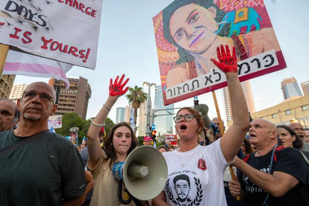 July 2, 2026, Tel Aviv, Israel: Protesters hold placards during an anti-government rally. A rally was held to mark 1,000 days since the October 7 massacre. Demonstrators protested against the Israeli government, accusing it of responsibility for the failures that led to the attack and calling for a state commission of inquiry, which they say the government opposes because its findings could implicate Prime Minister Benjamin Netanyahu. Tel Aviv Israel - ZUMAs197 20260702_aaa_s197_314 Copyright: xYaelxGuiskyxAbasx