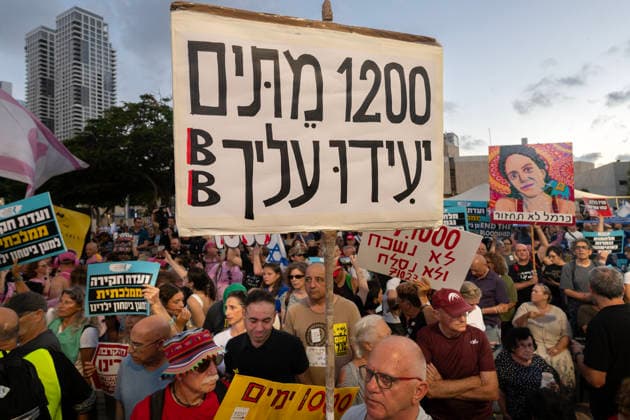 July 2, 2026, Tel Aviv, Israel: A protester holds a placard during an anti-government rally. A rally was held to mark 1,000 days since the October 7 massacre. Demonstrators protested against the Israeli government, accusing it of responsibility for the failures that led to the attack and calling for a state commission of inquiry, which they say the government opposes because its findings could implicate Prime Minister Benjamin Netanyahu. Tel Aviv Israel - ZUMAs197 20260702_aaa_s197_316 Copyright: xYaelxGuiskyxAbasx