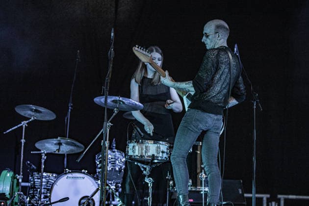 July 2, 2026, Soliera, Emilia Romagna, Italy: Singer and guitarist Craig Dyer of the British post-punk band The Underground Youth performs on stage during a concert. Singer and guitarist Craig Dyer performed on stage at Piazza Lusvardi in Soliera (Modena) during a concert by British post-punk band The Underground Youth. The event marked the opening night of the nineteenth edition of the Arti Vive Festival. Soliera Italy  - ZUMAs197 20260702_aaa_s197_413 Copyright: xCarloxVerganix