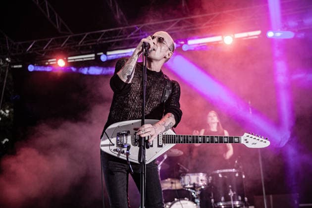 July 2, 2026, Soliera, Emilia Romagna, Italy: Singer and guitarist Craig Dyer of the British post-punk band The Underground Youth performs on stage during a concert. Singer and guitarist Craig Dyer performed on stage at Piazza Lusvardi in Soliera (Modena) during a concert by British post-punk band The Underground Youth. The event marked the opening night of the nineteenth edition of the Arti Vive Festival. Soliera Italy  - ZUMAs197 20260702_aaa_s197_416 Copyright: xCarloxVerganix