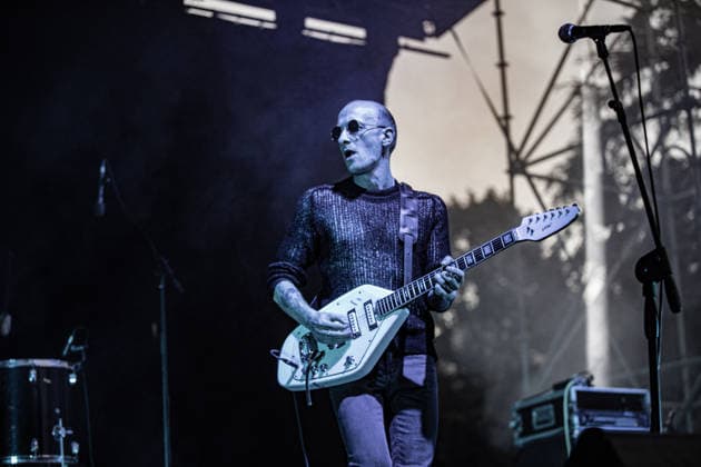 July 2, 2026, Soliera, Emilia Romagna, Italy: Singer and guitarist Craig Dyer of the British post-punk band The Underground Youth performs on stage during a concert. Singer and guitarist Craig Dyer performed on stage at Piazza Lusvardi in Soliera (Modena) during a concert by British post-punk band The Underground Youth. The event marked the opening night of the nineteenth edition of the Arti Vive Festival. Soliera Italy  - ZUMAs197 20260702_aaa_s197_421 Copyright: xCarloxVerganix