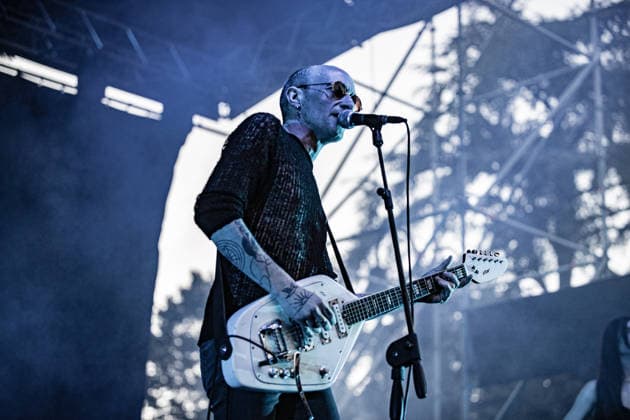 July 2, 2026, Soliera, Emilia Romagna, Italy: Singer and guitarist Craig Dyer of the British post-punk band The Underground Youth performs on stage during a concert. Singer and guitarist Craig Dyer performed on stage at Piazza Lusvardi in Soliera (Modena) during a concert by British post-punk band The Underground Youth. The event marked the opening night of the nineteenth edition of the Arti Vive Festival. Soliera Italy  - ZUMAs197 20260702_aaa_s197_425 Copyright: xCarloxVerganix