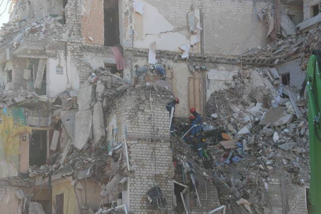 (260703) -- KIEV, July 3, 2026 -- Rescuers work at the site of a residential building damaged by a missile strike in Darnytskyi district, Kiev, Ukraine, July 2, 2026. At least 27 people were killed in a Russian attack on the Ukrainian capital on Thursday, Tymur Tkachenko, head of the Kiev City Military Administration, said. Damage was reported across all districts of the city, Kiev Mayor Vitali Klitschko wrote on Telegram, adding that the heaviest destruction occurred in the Darnytskyi district, where part of an apartment building collapsed. ) (SpotNews) UKRAINE-KIEV-MISSILE STRIKE-AFTERMATH LixDongxu 