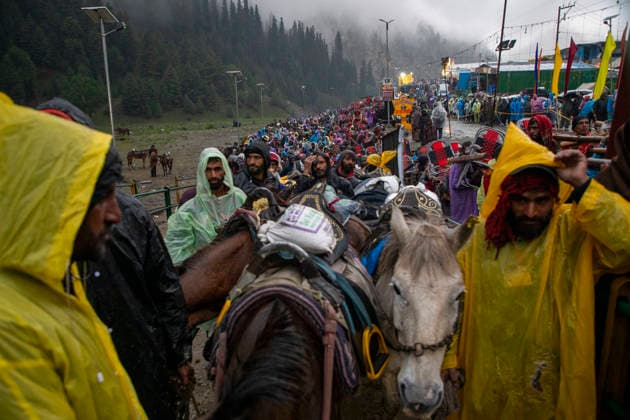 Annual Hindu Pilgrimage Amarnath Yatra begins in Baltal Sonamarg, India - 03 Jul 2026 Hindu devotees on foot make their way along a mountain path during the annual Amarnath pilgrimage to the cave shrine in Baltal some 100 km (62 miles) east of Srinagar. Thousands of Hindu pilgrims braving sub-zero temperatures begin the annual Amarnath Yatra trekking across glaciers, steep mountain trails and high altitude terrain to reach the sacred Amarnath cave shrine in the Himalayas of Indian-administered Kashmir. The cave houses a naturally formed ice stalagmite revered by devotees as a symbol of Lord Shiva, one of Hinduism s principal deities. The pilgrimage, which runs from July 3 to August 28 is expected to draw thousands of devotees making it one Copyright: xFaisalxBashirx xSOPAxImagesx 21AmarnathPilgrimage2026