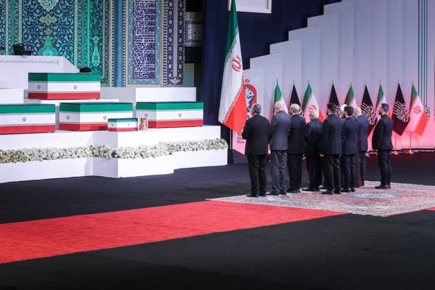 July 3, 2026, Tehran, Iran: Local and foreign officials walk past the coffins of Iran s slain supreme leader Ali Khamenei and his family members after paying their respects at the Grand Mosalla in Tehran on July 3, 2026. The body of Iran s supreme leader, killed in US-Israeli strikes that triggered the Middle East war, arrived at Tehran s Grand Mosalla on July 3 ahead of his funeral, state media reported. Millions of people and a coterie of foreign dignitaries were expected to attend Saturday s official ceremony for Ali Khamenei, with Tehran s chief negotiator calling for a massive turnout to avenge his death. Tehran Iran - ZUMAi98_ 20260703_zih_i98_038 Copyright: xIranianxSupremexLeader SxOfficex