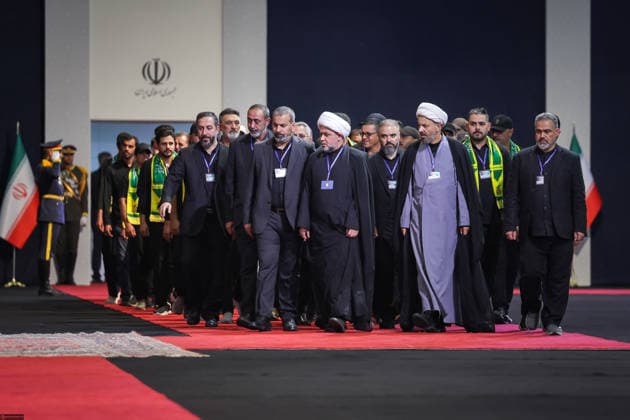 July 3, 2026, Tehran, Iran: Local and foreign officials walk past the coffins of Iran s slain supreme leader Ali Khamenei and his family members after paying their respects at the Grand Mosalla in Tehran on July 3, 2026. The body of Iran s supreme leader, killed in US-Israeli strikes that triggered the Middle East war, arrived at Tehran s Grand Mosalla on July 3 ahead of his funeral, state media reported. Millions of people and a coterie of foreign dignitaries were expected to attend Saturday s official ceremony for Ali Khamenei, with Tehran s chief negotiator calling for a massive turnout to avenge his death. Tehran Iran - ZUMAi98_ 20260703_zih_i98_060 Copyright: xIranianxSupremexLeader SxOfficex