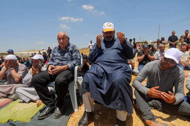 Palestinians hold Friday prayers on open land in West Bank to reaffirm their attachment to their land HEBRON, WEST BANK, PALESTINE - JULY 3: Palestinians perform Friday prayers on open land in the Hillat al-Hums area of Hebron, West Bank, on July 3, 2026. By praying on land where Israeli settlers recently erected tents nearby, Palestinians reaffirm their attachment to their land and their determination not to leave it, as Israeli soldiers maintain a presence in the area. Mamoun Wazwaz Anadolu Hebron West Bank. Editorial use only. Please get in touch for any other usage.  Copyright: x2026xAnadoluxMamounxWazwazx