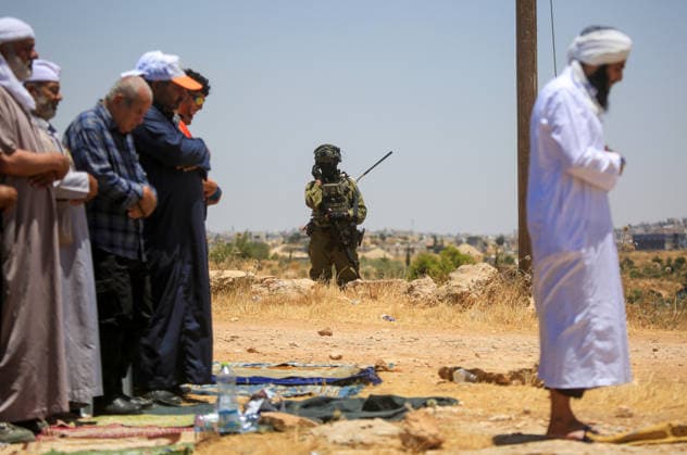 Palestinians hold Friday prayers on open land in West Bank to reaffirm their attachment to their land HEBRON, WEST BANK, PALESTINE - JULY 3: Palestinians perform Friday prayers on open land in the Hillat al-Hums area of Hebron, West Bank, on July 3, 2026. By praying on land where Israeli settlers recently erected tents nearby, Palestinians reaffirm their attachment to their land and their determination not to leave it, as Israeli soldiers maintain a presence in the area. Mamoun Wazwaz Anadolu Hebron West Bank. Editorial use only. Please get in touch for any other usage.  Copyright: x2026xAnadoluxMamounxWazwazx