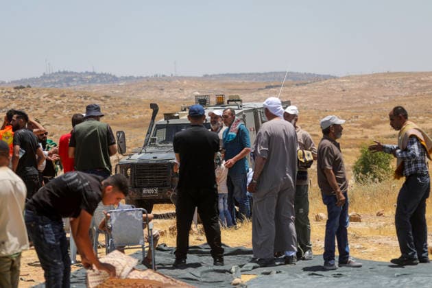 Palestinians hold Friday prayers on open land in West Bank to reaffirm their attachment to their land HEBRON, WEST BANK, PALESTINE - JULY 3: Palestinians perform Friday prayers on open land in the Hillat al-Hums area of Hebron, West Bank, on July 3, 2026. By praying on land where Israeli settlers recently erected tents nearby, Palestinians reaffirm their attachment to their land and their determination not to leave it, as Israeli soldiers maintain a presence in the area. Mamoun Wazwaz Anadolu Hebron West Bank. Editorial use only. Please get in touch for any other usage.  Copyright: x2026xAnadoluxMamounxWazwazx