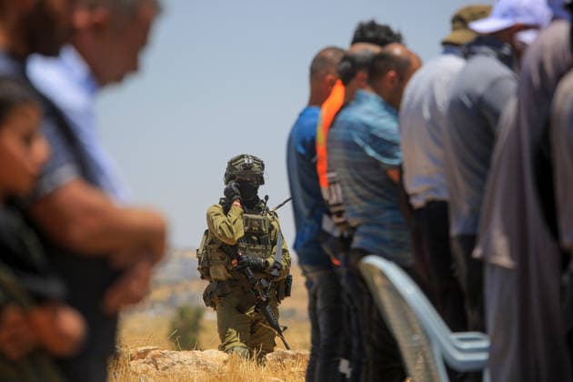 Palestinians hold Friday prayers on open land in West Bank to reaffirm their attachment to their land HEBRON, WEST BANK, PALESTINE - JULY 3: Palestinians perform Friday prayers on open land in the Hillat al-Hums area of Hebron, West Bank, on July 3, 2026. By praying on land where Israeli settlers recently erected tents nearby, Palestinians reaffirm their attachment to their land and their determination not to leave it, as Israeli soldiers maintain a presence in the area. Mamoun Wazwaz Anadolu Hebron West Bank. Editorial use only. Please get in touch for any other usage.  Copyright: x2026xAnadoluxMamounxWazwazx