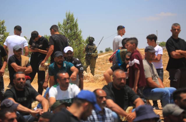 Palestinians hold Friday prayers on open land in West Bank to reaffirm their attachment to their land HEBRON, WEST BANK, PALESTINE - JULY 3: Palestinians perform Friday prayers on open land in the Hillat al-Hums area of Hebron, West Bank, on July 3, 2026. By praying on land where Israeli settlers recently erected tents nearby, Palestinians reaffirm their attachment to their land and their determination not to leave it, as Israeli soldiers maintain a presence in the area. Mamoun Wazwaz Anadolu Hebron West Bank. Editorial use only. Please get in touch for any other usage.  Copyright: x2026xAnadoluxMamounxWazwazx