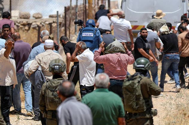 Israeli soldiers intervene against Palestinians performing Islamic Friday prayer BETHLEHEM, WEST BANK, PALESTINE - JULY 03: Israeli soldiers intervene with stun grenades and tear gas against Palestinians performing Friday prayers during a raid on the village of Abu Nujaym, near Bethlehem in West Bank, Palestine on July 03, 2026. Tensions erupted between several Palestinian residents and Israeli soldiers. Wisam Hashlamoun Anadolu Bethlehem West Bank. Editorial use only. Please get in touch for any other usage.  Copyright: x2026xAnadoluxWisamxHashlamounx