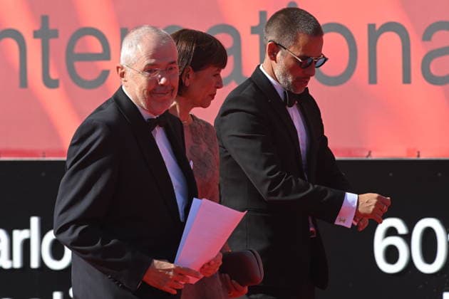 From left: moderator Marek Eben, archaeologist Andrea Bartoskova, and actor Jan Janek Bartoska arrive at the opening of the 60th Karlovy Vary International Film Festival, on June 3, 2026, in Karlovy Vary, Czech Republic. (CTKxPhoto SlavomirxKubes) CTKPhotoP2026070306553  CTKPhotoP2026070306553