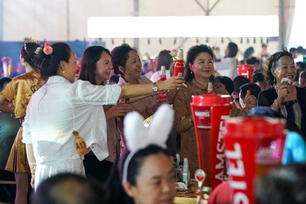 HARBIN, CHINA - JULY 03: Citizens drink beer inside a tent during the opening of the 24th Harbin International Beer Festival at Harbin Ice and Snow World on July 3, 2026 in Harbin, Heilongjiang Province of China. The festival features eight functional zones including five beer tents and 11 international beer gardens.  Copyright: xChinaxNewsxServicex 111652053278
