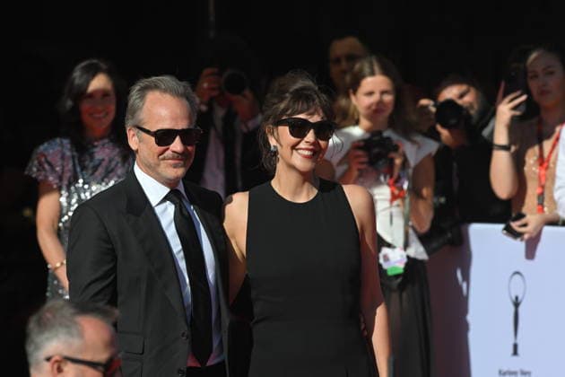 American actor Peter Skarsgard, left, and American actress Maggie Gyllenhaal arrive at the opening of the 60th Karlovy Vary International Film Festival, on June 3, 2026, in Karlovy Vary, Czech Republic. (CTKxPhoto SlavomirxKubes) CTKPhotoP2026070306856  CTKPhotoP2026070306856