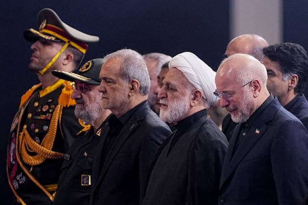 Iranian Parliament Speaker and chief negotiator Mohammad Bagher Ghalibaf (R) and Iranian President Masoud Pezeshkian (C ) attend the reception for foreign and domestic officials offering condolences at the funeral of the late Supreme Leader Ayatollah Ali Khamenei and his family at Tehran s Grand Imam Khomeini Mosque on Friday, July 3, 2026. Khamenei and his relatives were assassinated on February 28 in U.S.-Israeli airstrikes at the outset of the war, ending his 36-year rule. A six-day state funeral across multiple cities will conclude with his burial on July 9 in his hometown of Mashhad. Iran has suspended negotiations with the U.S. delegation until the funeral concludes. photo by Iranian Presidency  IRN2026070319 IranianxPresidency