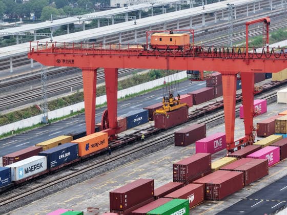 YANGZHOU, CHINA - JULY 04: A freight train loads containers at the Jiangdu railway special line logistics base on July 4, 2026 in Yangzhou, Jiangsu Province of China. China s state railway system completed a freight volume exceeding 2 billion tons in the first half of 2026.  Copyright: xVCGx 111652158873