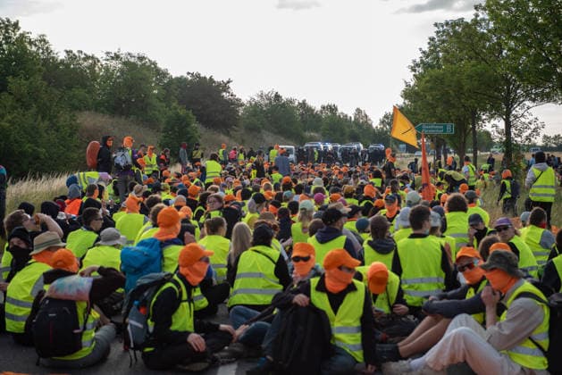 Mass demonstrations accompany AfD party congress in eastern Germany ERFURT, GERMANY - JULY 4: Protesters block the roads leading to the Messe Erfurt exhibition grounds during demonstrations against the federal party congress of the Alternative for Germany (AfD) in Erfurt, Germany, on July 4, 2026. Around 8:30 a.m., demonstrators established approximately nine coordinated blockades, occupying all major access routes to the congress venue in an attempt to prevent AfD delegates from reaching the event. More than police officers were deployed to secure the congress, clear blockades and maintain access to the venue. The AfD is a right-wing populist political party whose positions on immigration and national identity have made it one of Germany s  Copyright: x2026xAnadoluxMouafakxMahmaljix
